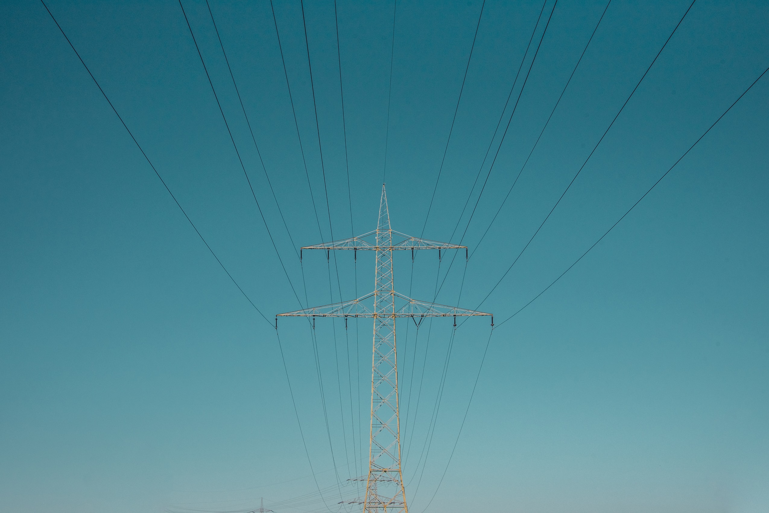grid power tower on clear sky background