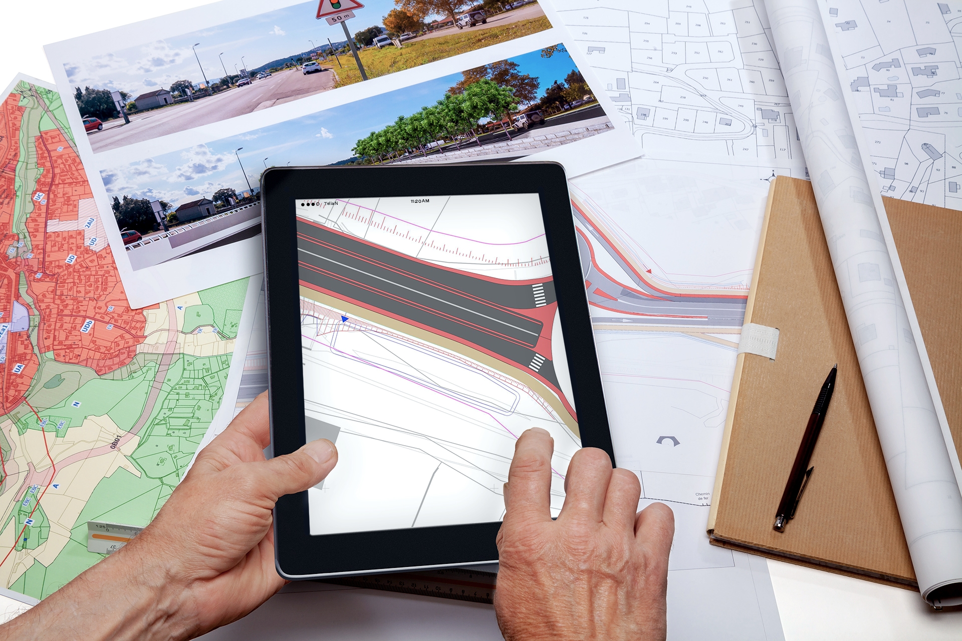 Image of a person working on the tablet terrain plan to represent Tracing & Sightline Analysis