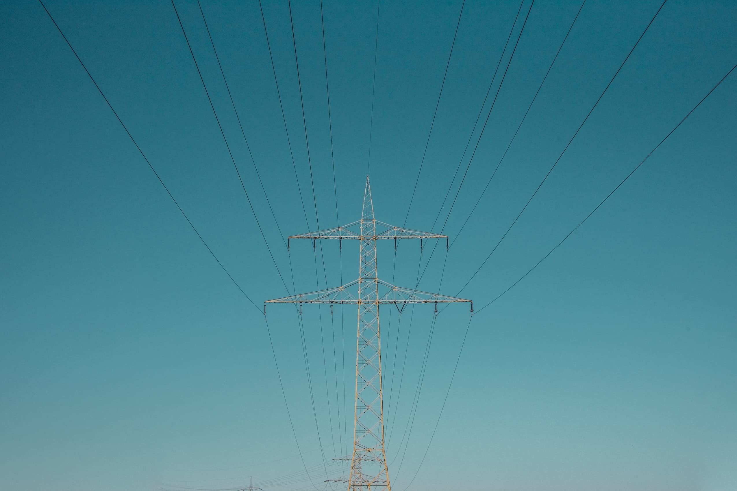 grid power tower on clear sky background