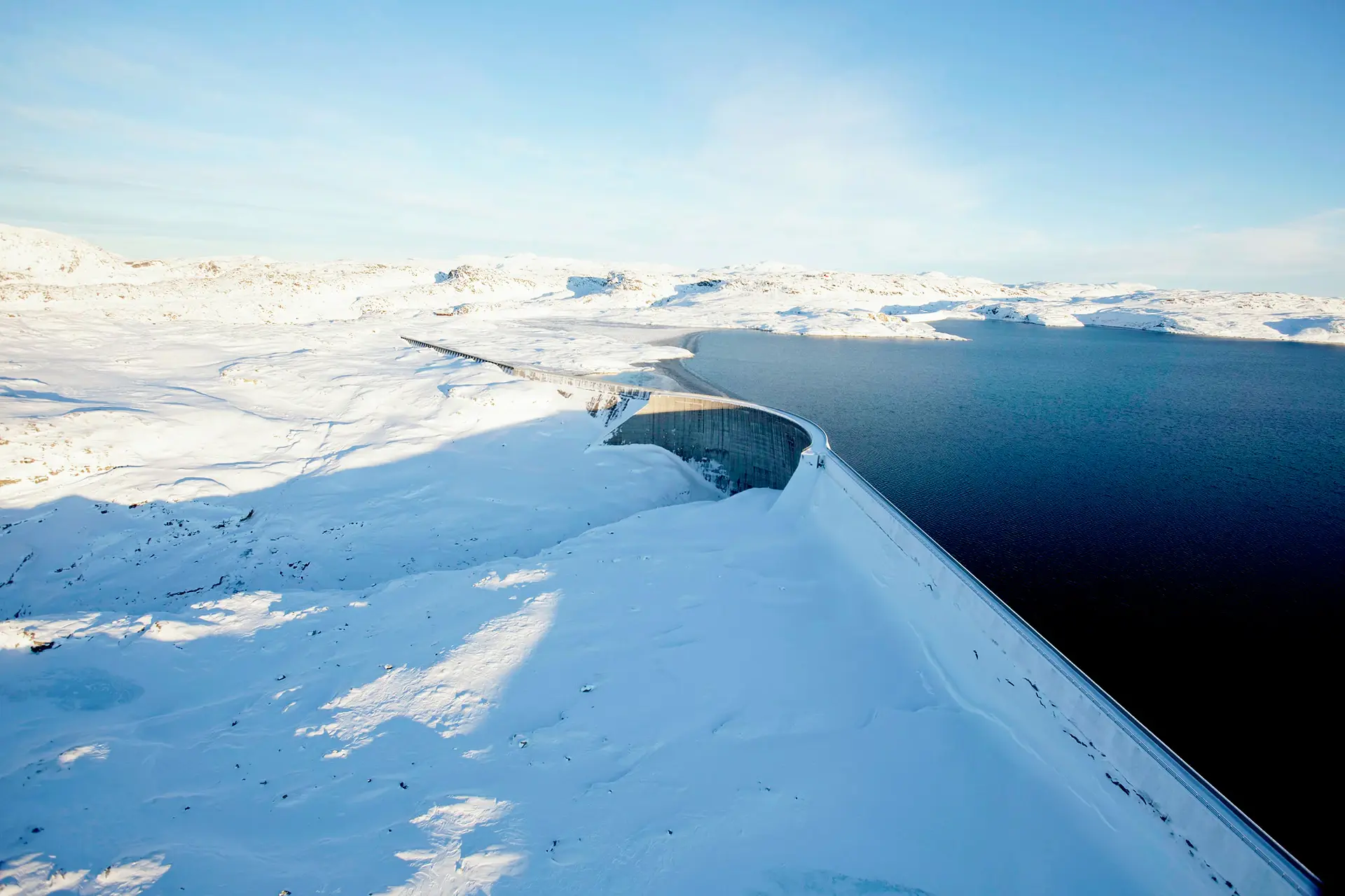 Hydro power plant dam in winter landscape